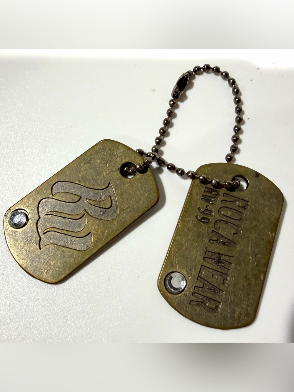 Y2K Vintage Rocawear Brown/Antique Brass Finish Brass Dog Tag Keychain Bag Charm
